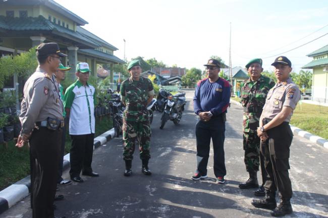 May Day, Polres Bengkalis Mengadakan Aksi Damai Penanaman Pohon