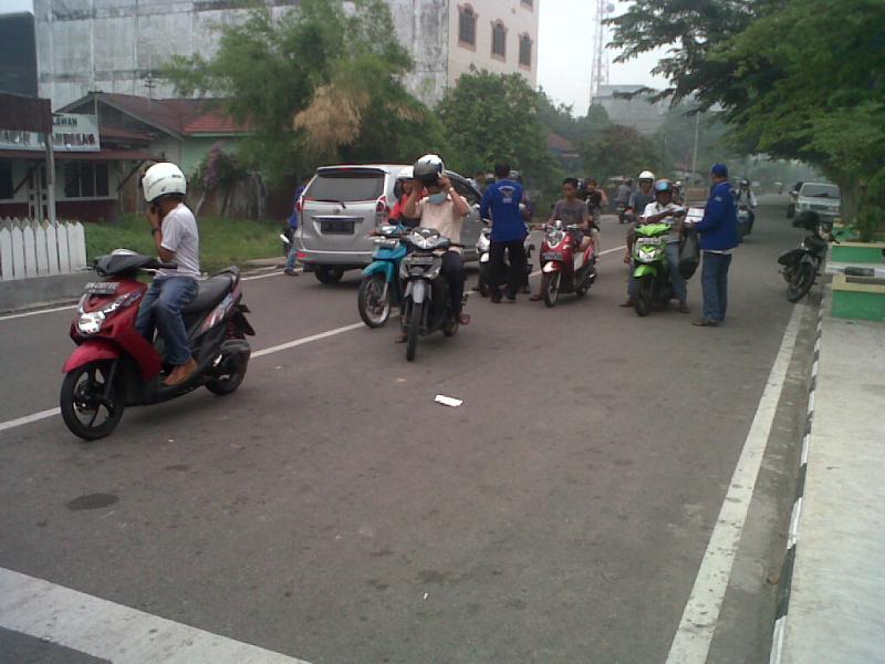 Peduli Kabut Asap, Tim Pemenangan SNI Bagikan 3.000 Masker  