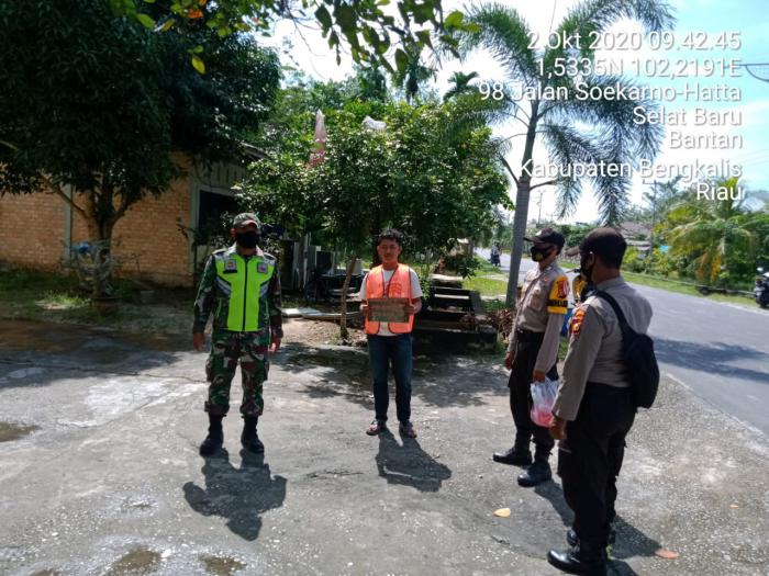 Serda Armansyah Ingatkan Masyarakat di Desa Selat Baru agar Selalu Menggunakan Masker