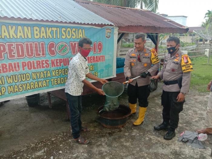 Kapolres Pimpin Panen Ikan Lele di Merbau