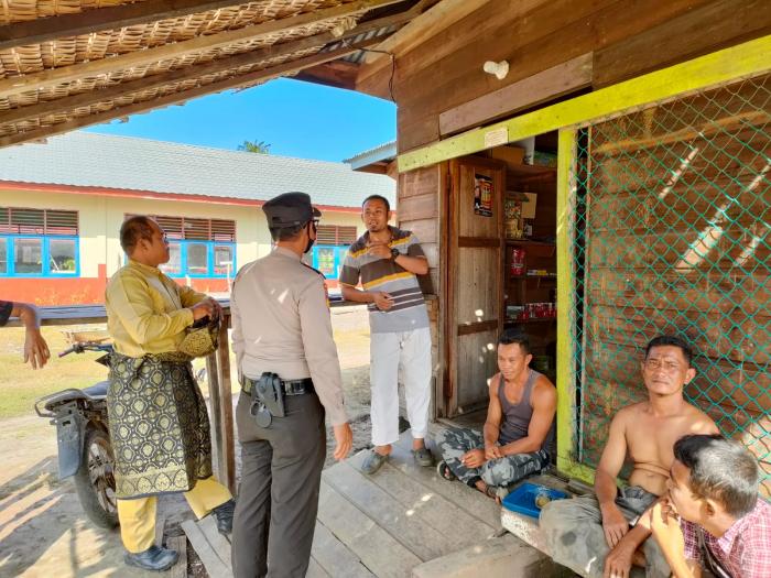 Polsek Merbau Door to Door Ajak Warga Ikut Vaksinasi Covid-19