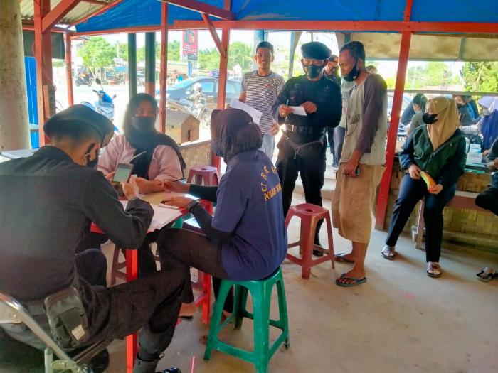 Gabungan Brimob Dan Polres Rohil Gelar Patroli Vaksinasi
