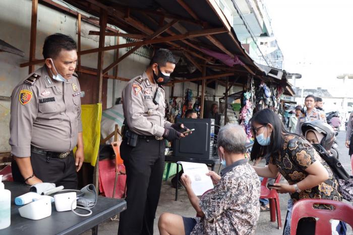 Polres Meranti Gelar Vaksinasi Covid-19 di Pasar, Sasar Pedagang dan Pengunjung