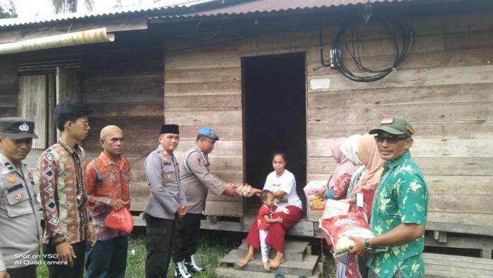Rafasa dan Viola dapat Bantuan Asupan Gizi dari Polsek Merbau