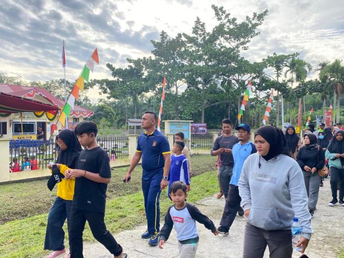 Ratusan Masyarakat Antusias Ikuti Jalan Santai dan Olahraga Bersama Polsek Rangsang