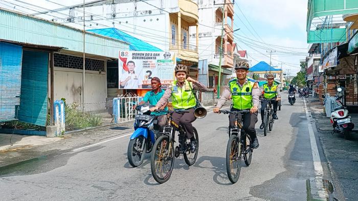  Polres Meranti Gelar Sosialisasi Pemilu Damai dengan Berpatroli Sepeda